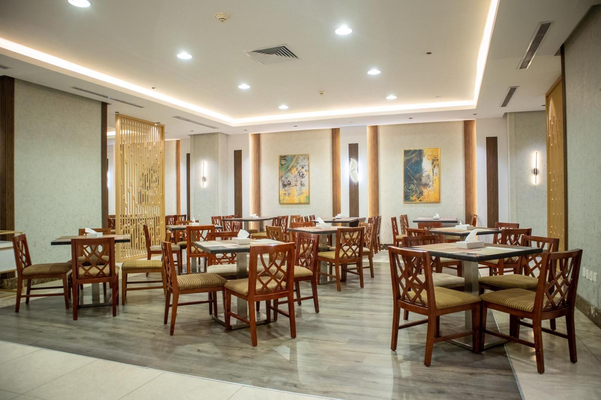 Emaar Royal Hotel Medina Exterior foto The dining room at the hospital